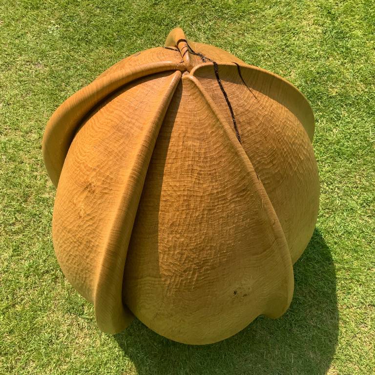 carved wooden outdoor sculpture