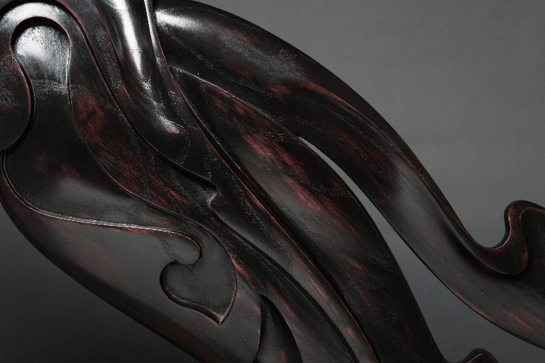 more detailed carving in the artwork