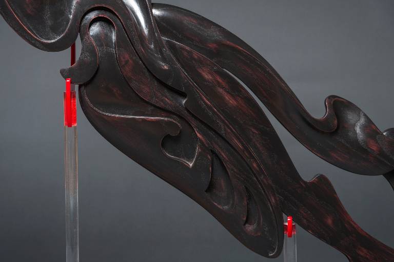 mid section of the hand carved wood sculpture
