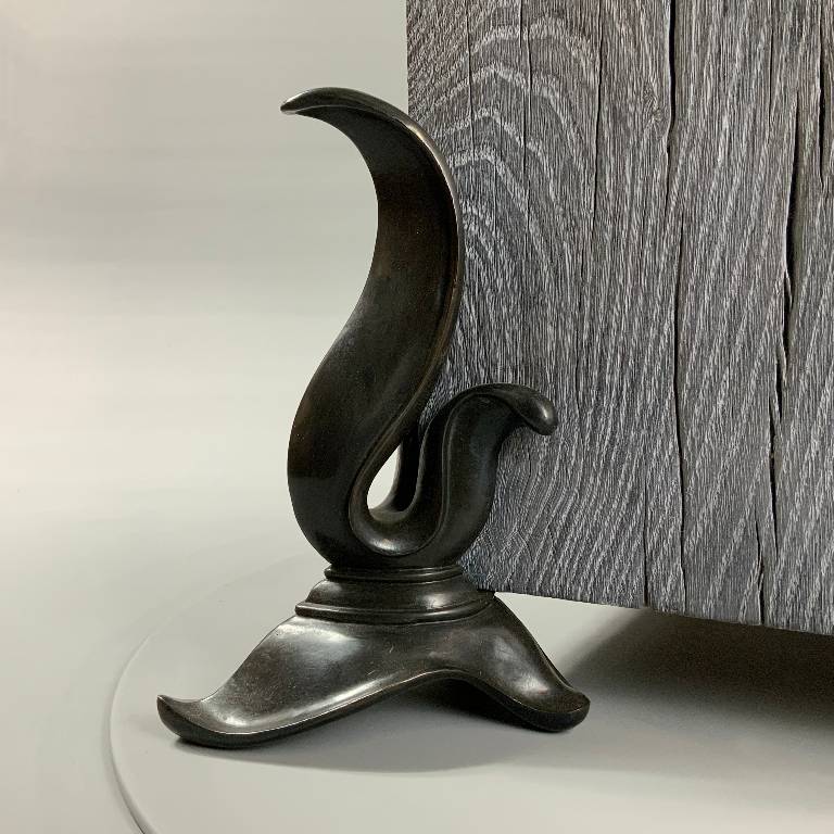 The beautifully crafted cast bronze feet are patinated and rubbed
