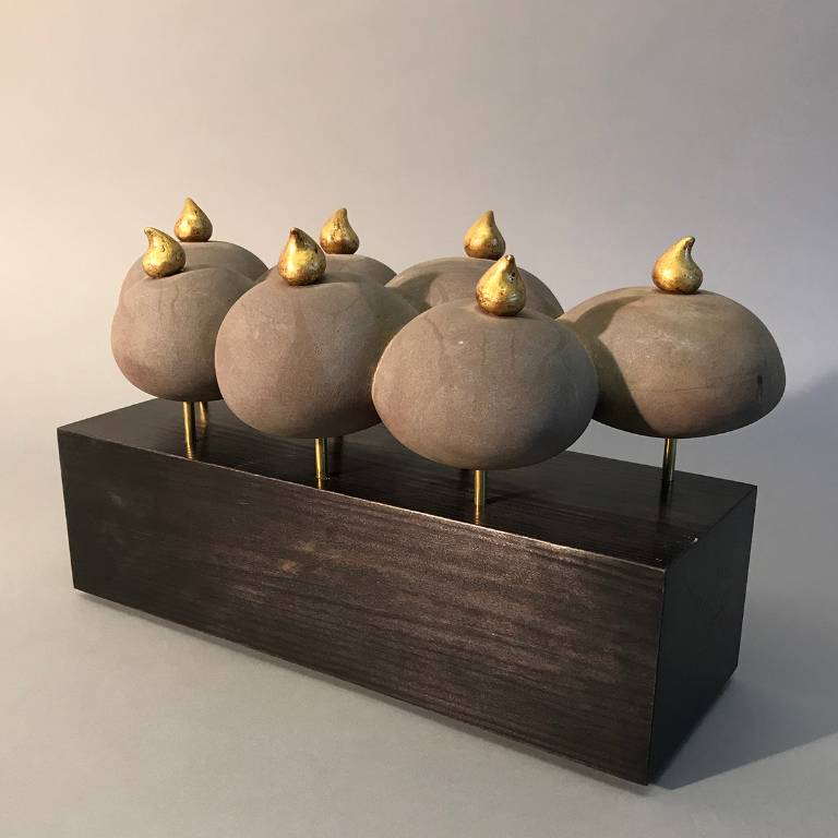 Strange Fruit - a sandstone and gilded plaster sculpture by Misti Leitz