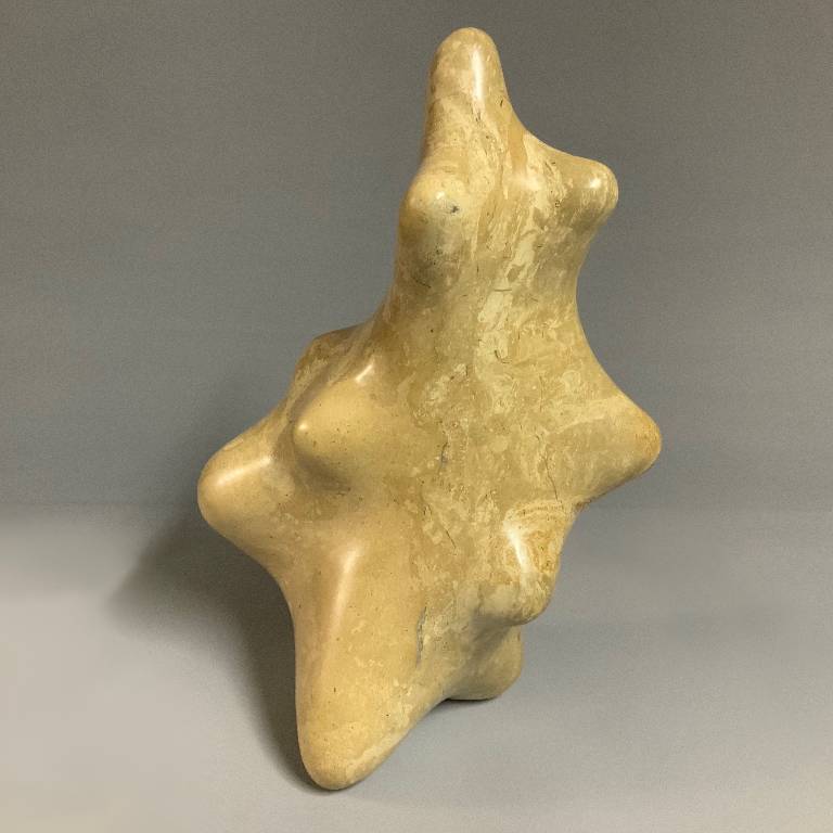 The Untold Secret a carved stone sculpture by Misti Leitz